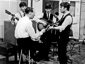 Photo of George Martin with the Beatles in the Studio. Original source: <em>The Guardian</em>, www.theguardian.com/music/2016/mar/09/george-martin-producer-of-the-beatles-dies-aged-90